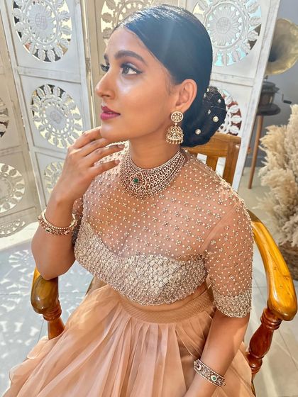 Another beautiful shot of Akanksha, highlighting the intricate bead and sequin work on her custom blouse.