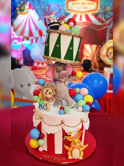 I love a design challenge, and this topsy-turvy carnival cake was a joy to engineer. Featuring a balancing elephant, a playful lion, and a rabbit popping out of a hat, this gravity-defying cake brings all the fun of the circus to the party. It shows that your imagination is truly the only limit.