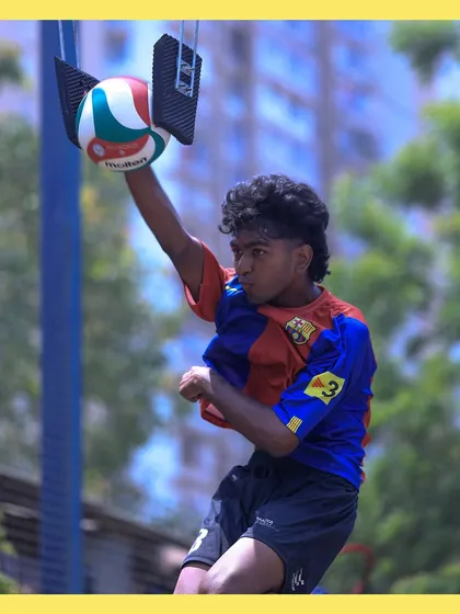 This young spiker shows incredible focus as he uses the training equipment to refine his hitting skills.