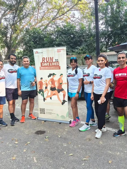 A group photo from a "Run to Save Lives" event. We are proud to run for a good cause.