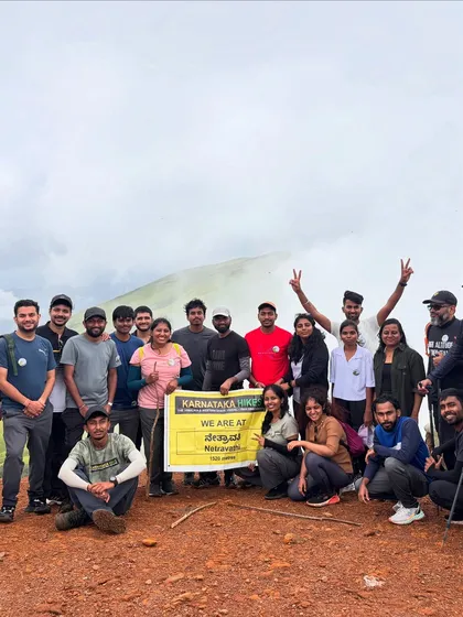 Our group proudly holding the Karnataka Hikes banner at the Netravathi summit.
