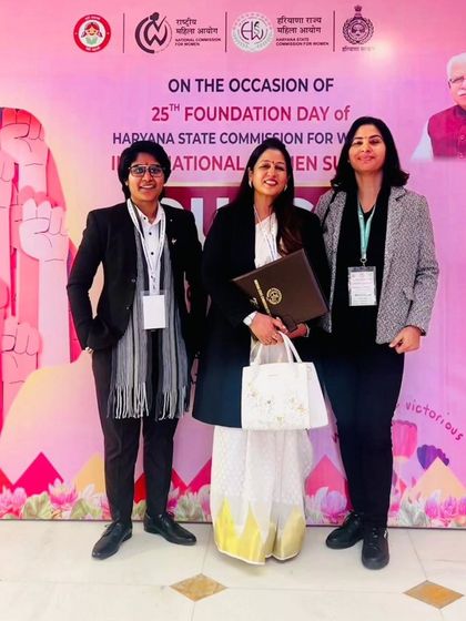 Another photo with my team at the summit, standing before the 'Durga' backdrop.