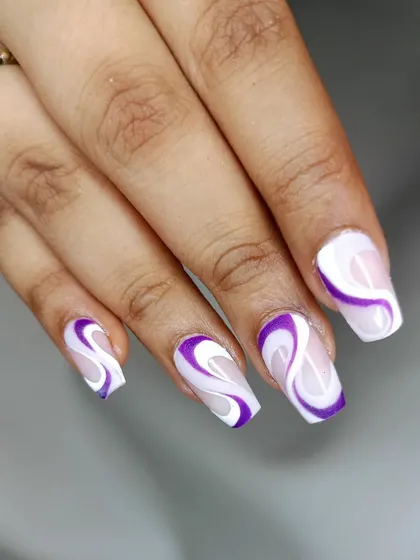 A vibrant purple and white swirl design on long, square-shaped nails for a bold, retro-inspired look.