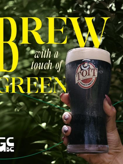 A brew with a touch of green. Enjoying a dark, rich beer surrounded by the lush foliage of our garden.