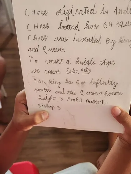 A student's handwritten notes on the basics of chess, including piece values and the origin of the game. We encourage active learning and retention of key concepts.