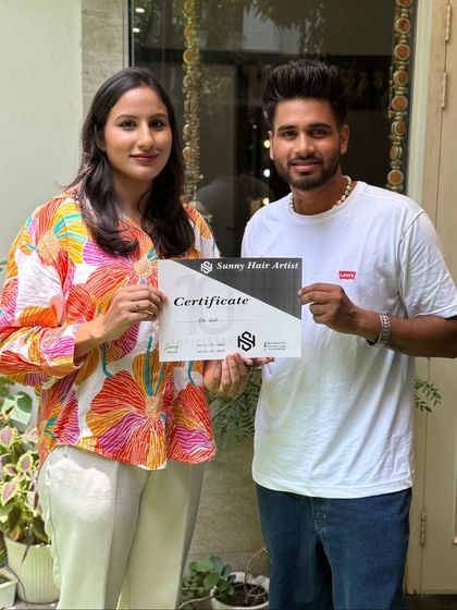 Celebrating the successful completion of my intensive hairstyling workshop. This certificate marks the beginning of a new chapter in her professional career.