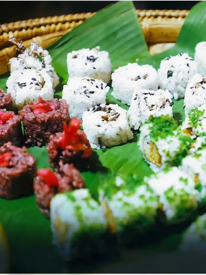 A close-up of our creative sushi offerings, including beetroot-infused rice rolls. This dish showcases our innovative approach to classic cuisines, providing a unique visual and tasting experience.