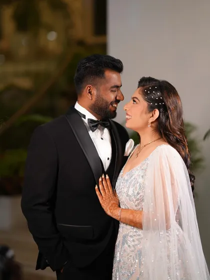 A happy couple portrait from the engagement. Their joy is infectious, and her makeup looks fresh and beautiful.