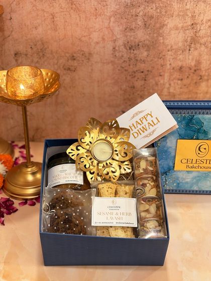 Our 'Diwali Joy Box' is a perfect blend of our tasty, healthy treats, paired with a beautiful lotus metallic candle.