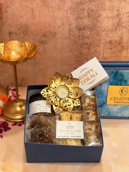 Our 'Diwali Joy Box' is a perfect blend of our tasty, healthy treats, paired with a beautiful lotus metallic candle.