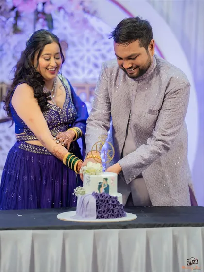 The cake cutting ceremony is always a moment of joy. Here, Prachi and Ketan share a laugh as they cut their unique, custom-designed engagement cake.