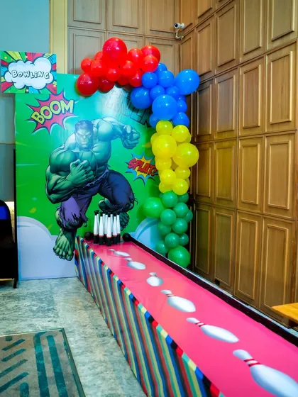 Hulk-smash bowling. We design custom games that fit the theme perfectly, like this fun bowling alley featuring the Incredible Hulk.