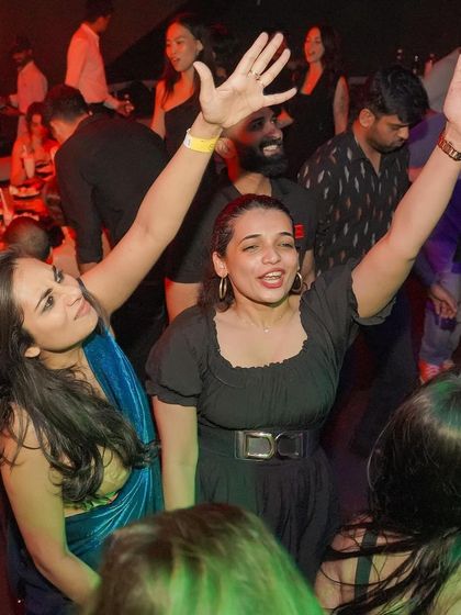 Hands up and living in the moment. This is what a great night out is all about.