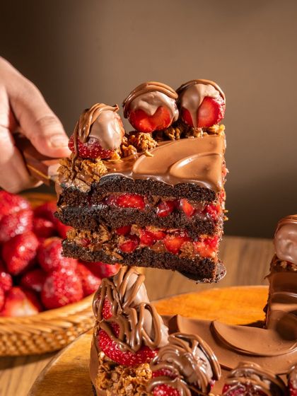 Introducing our Crunchy Crumble Nutella Strawberry cake. The textural contrast between the smooth Nutella, tangy strawberries, and our artisanal crumble makes this a masterpiece.
