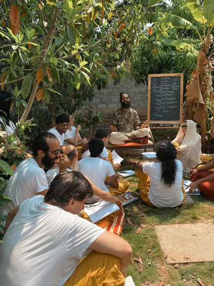 This is a duplicate of image 98, showing an outdoor philosophy class where we connect the ancient teachings of yoga to the natural world around us.