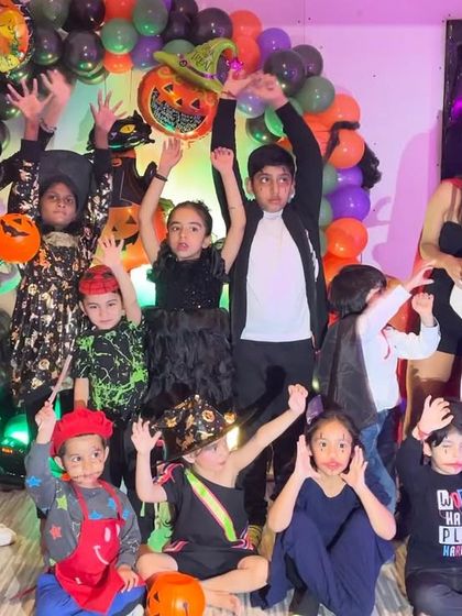More spooky fun from our Halloween celebration! The kids loved showing off their costumes and making scary faces for the camera.