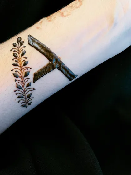 The fresh paste of the custom 'A' initial design, showing the bold, clean lines.