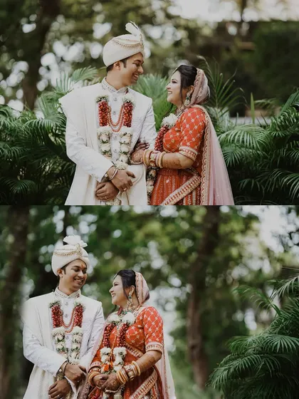 A classic wedding portrait of a couple in a lush green setting. Their traditional red and white outfits contrast beautifully with the natural background, creating a timeless image.