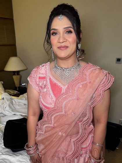 A behind-the-scenes moment of me applying makeup. I take my time to ensure every detail is perfect.