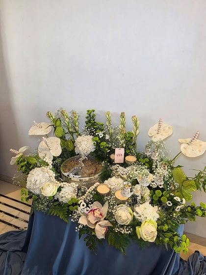 A full view of the white and silver hamper, demonstrating a sophisticated and timeless gifting style.