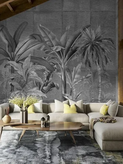 This monochrome tropical mural from the Prakriti collection adds a sophisticated, modern touch to this living space. The design is printed on a textured base, giving it depth and a rich, tactile feel.