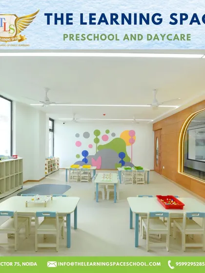 Another view of one of our spacious classrooms, featuring colorful wall murals and neatly arranged learning centers that invite children to explore.