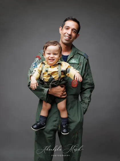 A duplicate image that perfectly captures the fun and loving spirit of this father and son duo.