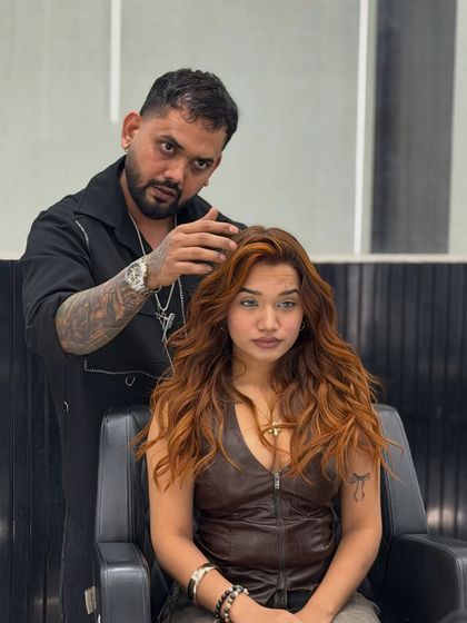 The concentration and precision it takes to create the perfect copper glow. Every strand is carefully colored to ensure a seamless and vibrant result.