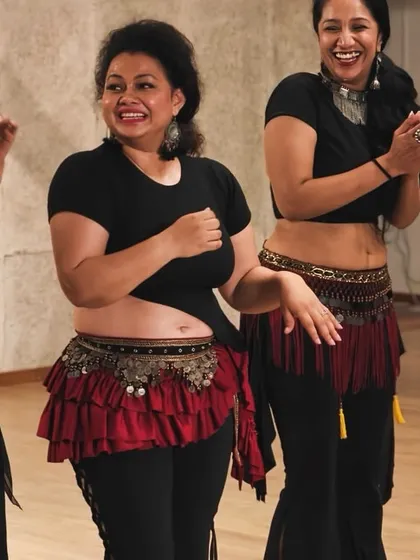 Candid smiles and laughter from our "Circle of Dance" hafla. These informal gatherings are the heart of our community.