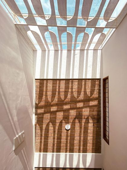 A collection of images that further explore our fascination with light. These photos capture how skylights, courtyards, and jaali walls fill our buildings with dynamic patterns of light and shadow.