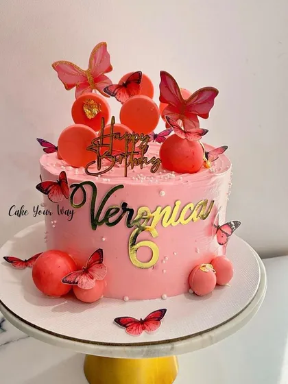 Fluttering into sweet celebrations with this pink butterfly cake for Veronica's 6th birthday.