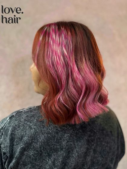 A little late for Valentine's Day, but we celebrate love every day. This look features a mix of red and pink with a pop of blonde for a fun, romantic vibe.