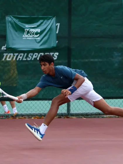 This is what high-stakes competition looks like. One of my top athletes, Tavish Pahwa, is captured here in full flight during a match at the World U14 Asia Oceania competition. My training develops the dynamic movement and technical precision required to excel on the world stage.