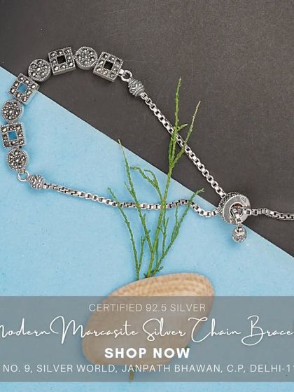 A modern bracelet with square and round motifs set with fine quality Swiss marcasites. The adjustable chain ensures a perfect fit.