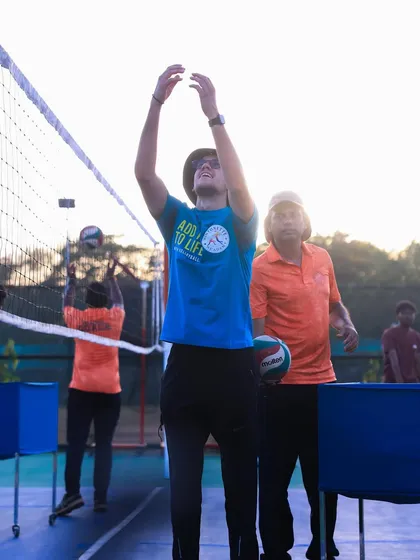 I demonstrate the setting motion during our golden hour training session. Perfect form is a constant goal.