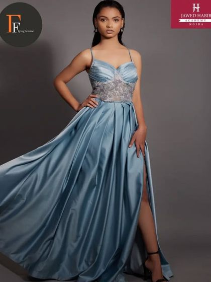 Another angle of the blue gown, showing the elegant hair and makeup that complements the dress perfectly.