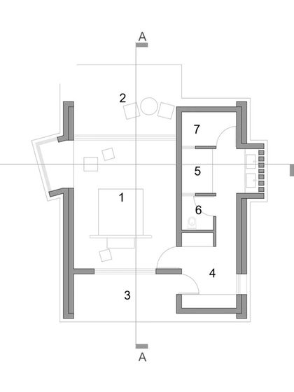 The floor plan of a single cottage at Waghoba Ecolodge. The layout is designed for passive cooling, with thick adobe walls and openings positioned to catch breezes while offering views of the forest.