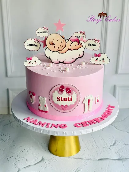 Sweet beginnings and a name as beautiful as she is. This naming ceremony cake for baby Stuti is decorated in lovely shades of pink with all her birth details.
