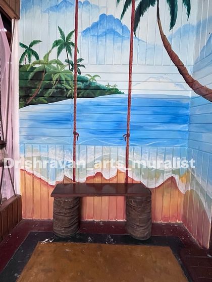 I created this beach-themed mural as a backdrop for a swing. The painting gives the illusion of sitting on a beach in Goa, complete with sand, sea, and palm trees.