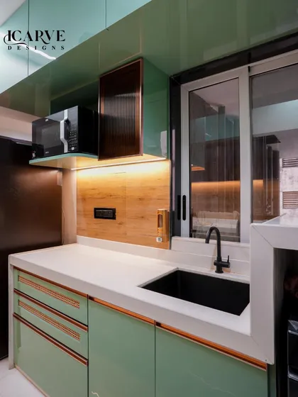 This angle shows the sink area and the dedicated, elevated shelf for the microwave, freeing up valuable counter space.