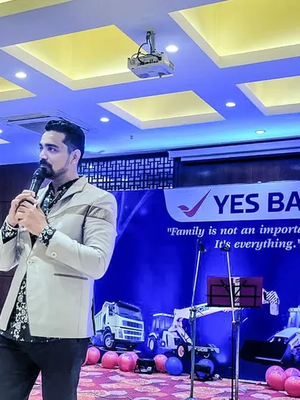 On stage hosting a festive Diwali party for the team at Yes Bank. I adapt my style to fit the occasion, ensuring a professional yet fun atmosphere for your corporate celebrations.