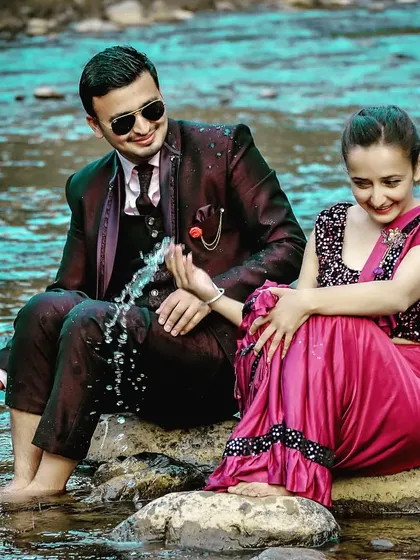A playful moment from a pre-wedding photoshoot by a river. I encourage couples to be themselves, which results in fun, lifestyle photos that truly reflect their personality and connection.