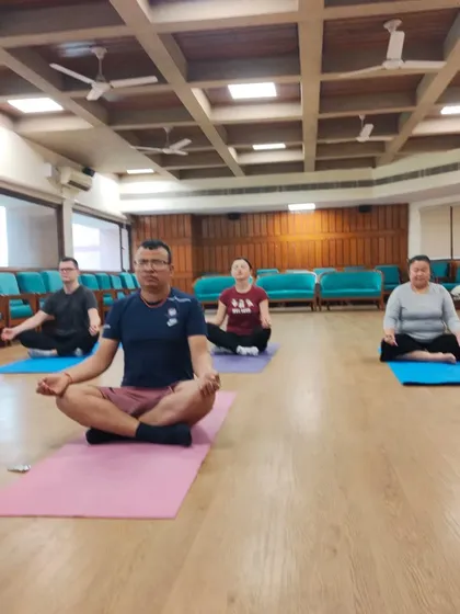 Students from our March-April international yoga teacher training batch practicing seated meditation. We focus on building a strong foundation in mindfulness and concentration.