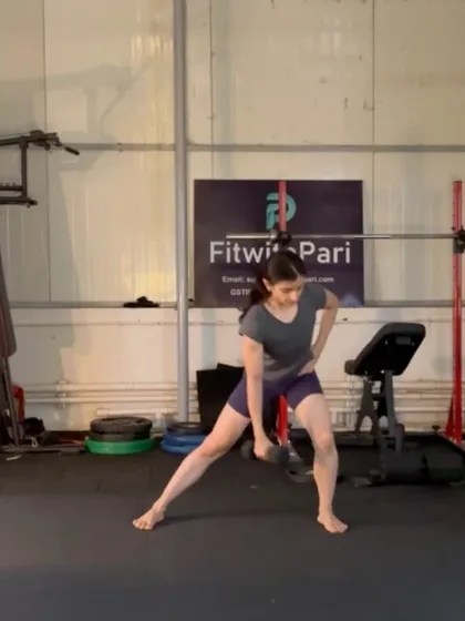A side lunge with a dumbbell. This move is excellent for building strength and flexibility in the inner and outer thighs.