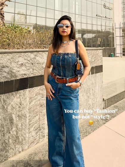 You can buy 'fashion', but you can't buy 'style'. This denim on denim look is all about personal style and confidence.