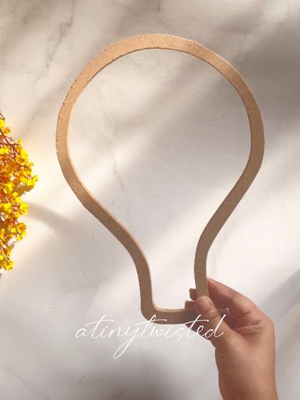 The lightbulb-shaped MDF frame is the base for my popular parachute nameplates. It's a creative shape that can be used for all sorts of imaginative art projects.