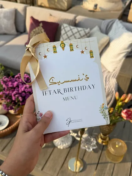 The custom-designed menu for the Iftaar birthday, reflecting the elegant theme of the evening.