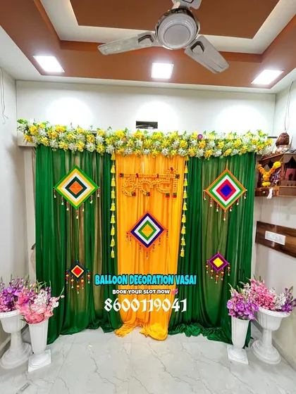This compact indoor Haldi setup shows how we can transform any space with colorful drapes and traditional decorative elements.