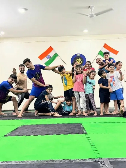 We are a team, a family. We train hard, but we also know how to have fun and support each other. This picture captures the real spirit of our academy, a place where kids build friendships and confidence together.