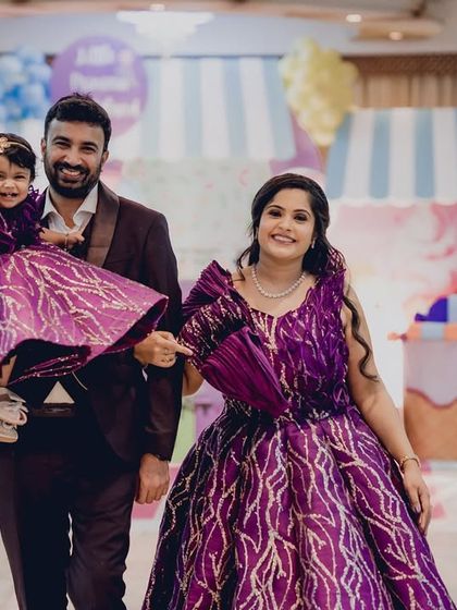 The happy family walking through their Candyland dream, with the birthday girl looking adorable in her matching dress.